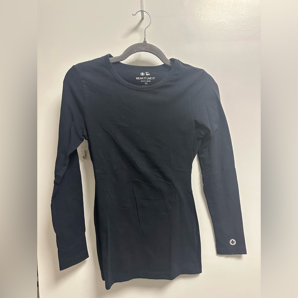 Long Sleeve Crew Neck Top in black under scrub